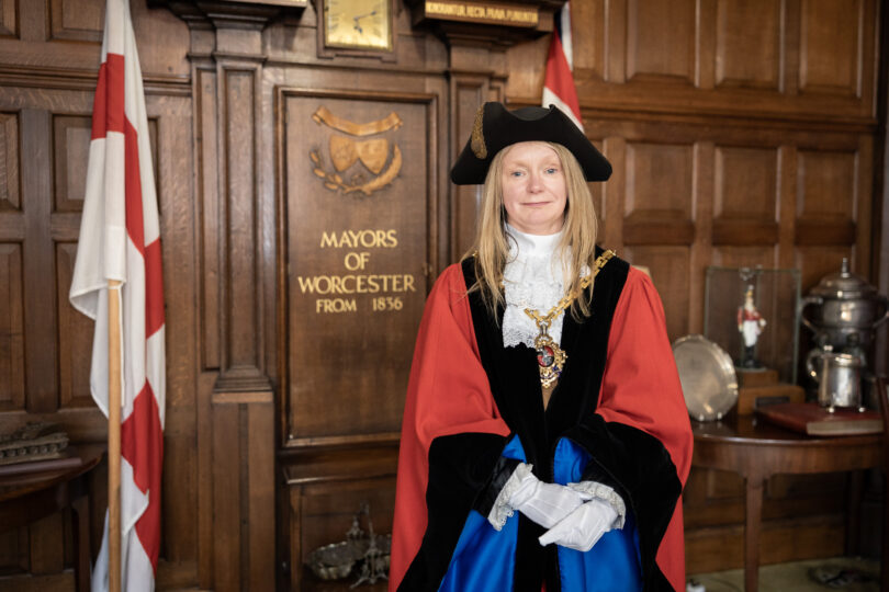 The Mayor of Worcester, Cllr Mel Allcott, wearing her ceremonial robes, standing in the Guildhall Parlour 